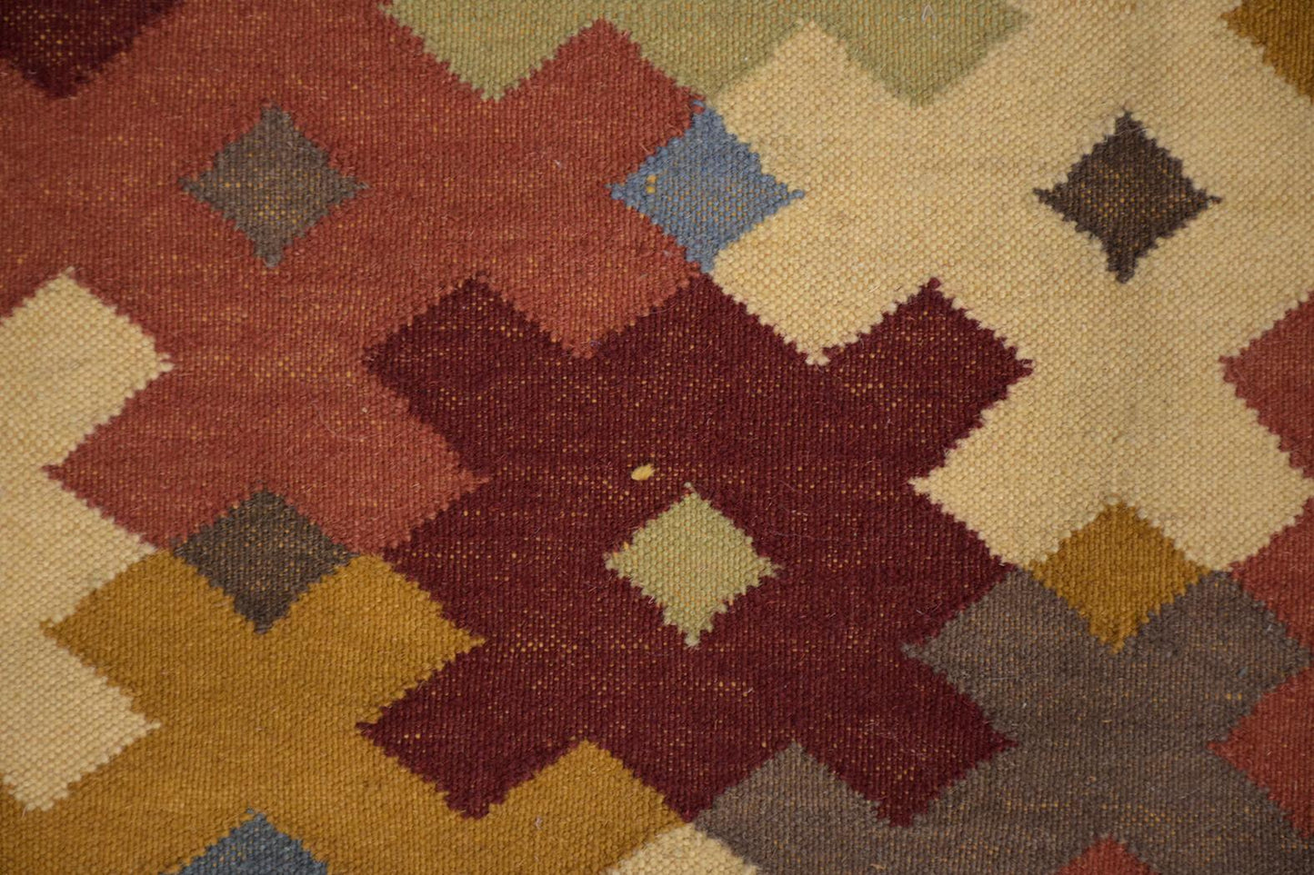 Early 1900s Multicolor Symmetrical Pattern Textile Rug: Perfect for Sophisticated Spaces