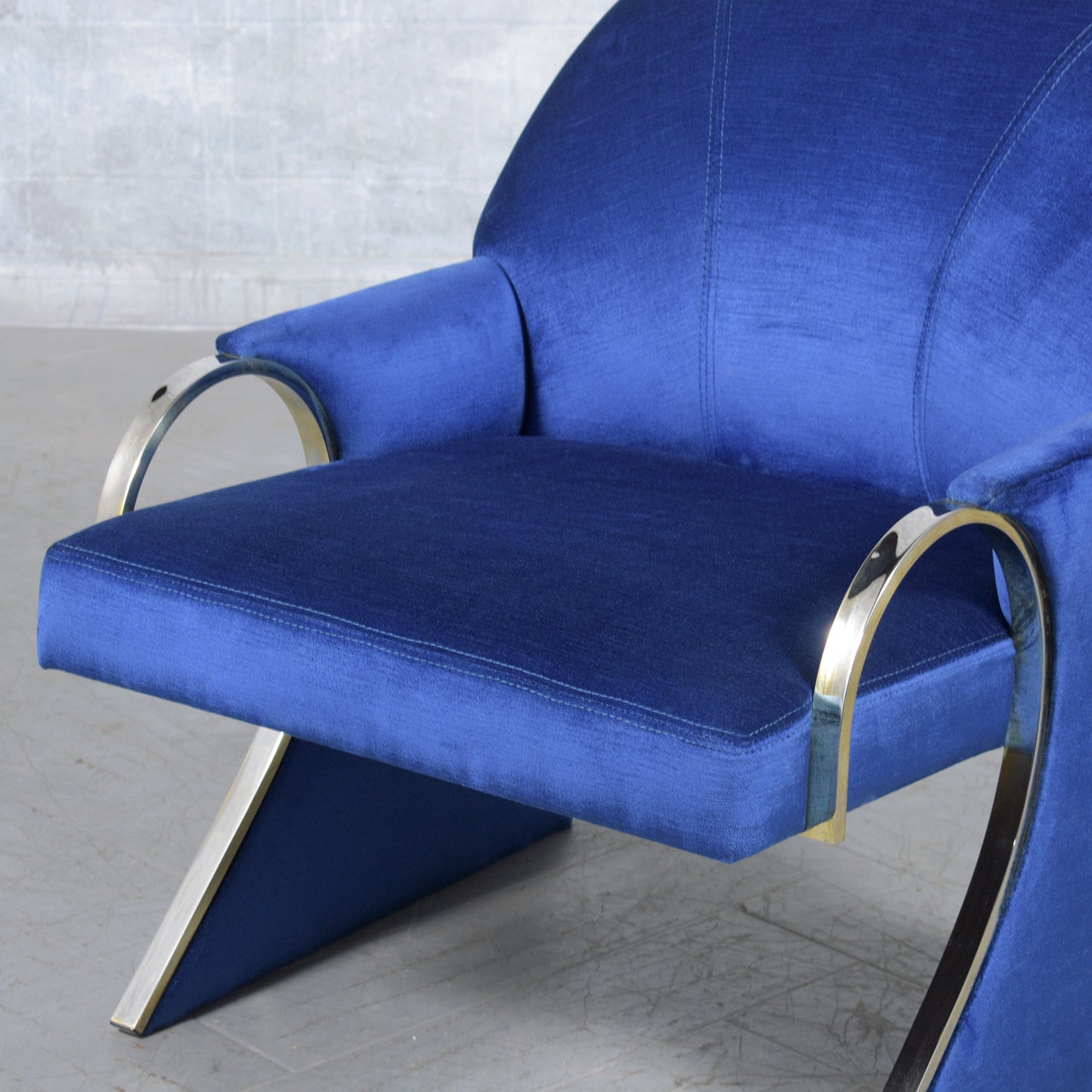 Pair of Mid-Century Modern Lounge Chairs in Dark Blue Velvet with Chrome Details