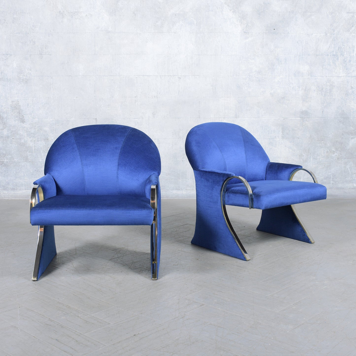 Pair of Mid-Century Modern Lounge Chairs in Dark Blue Velvet with Chrome Details