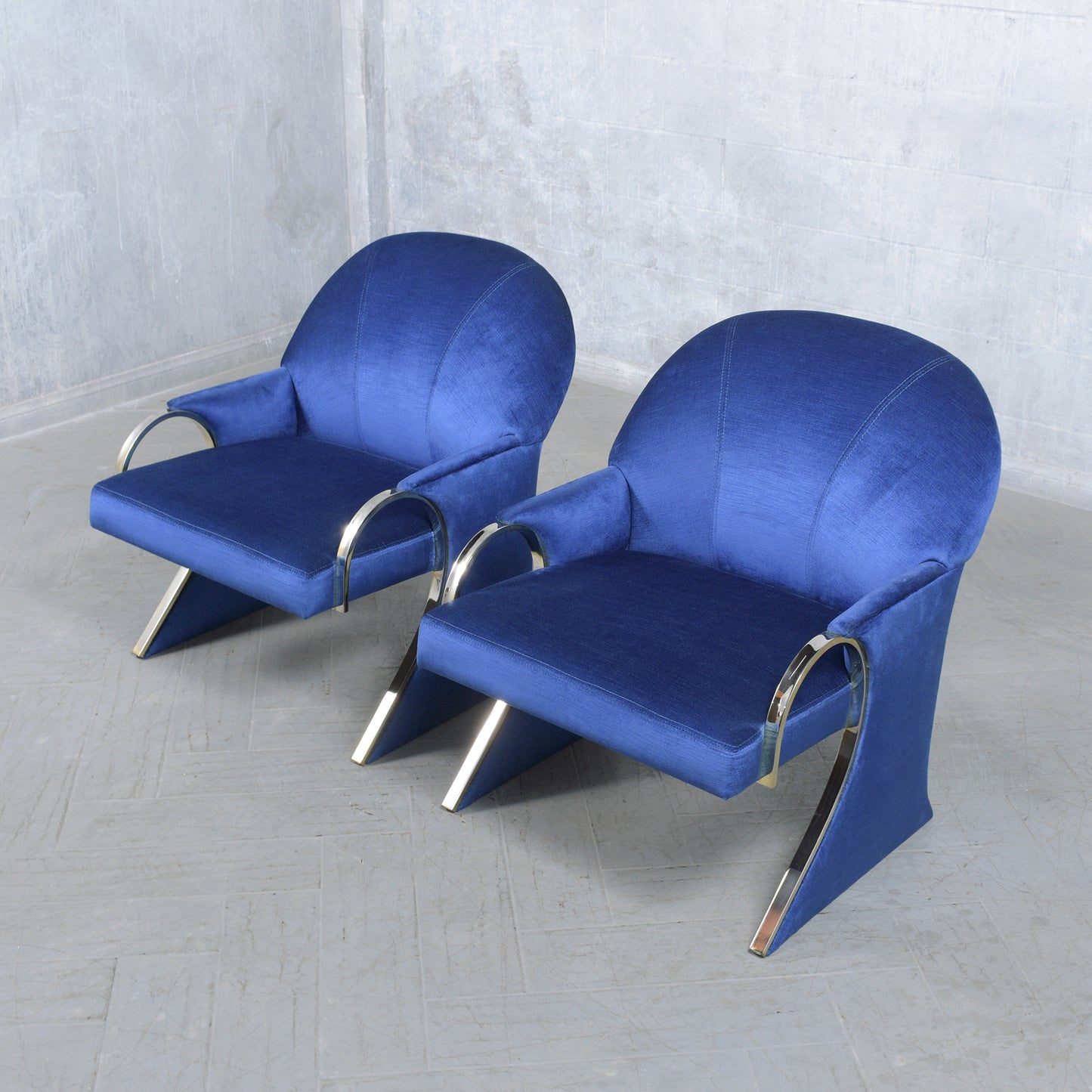 Pair of Mid-Century Modern Lounge Chairs in Dark Blue Velvet with Chrome Details