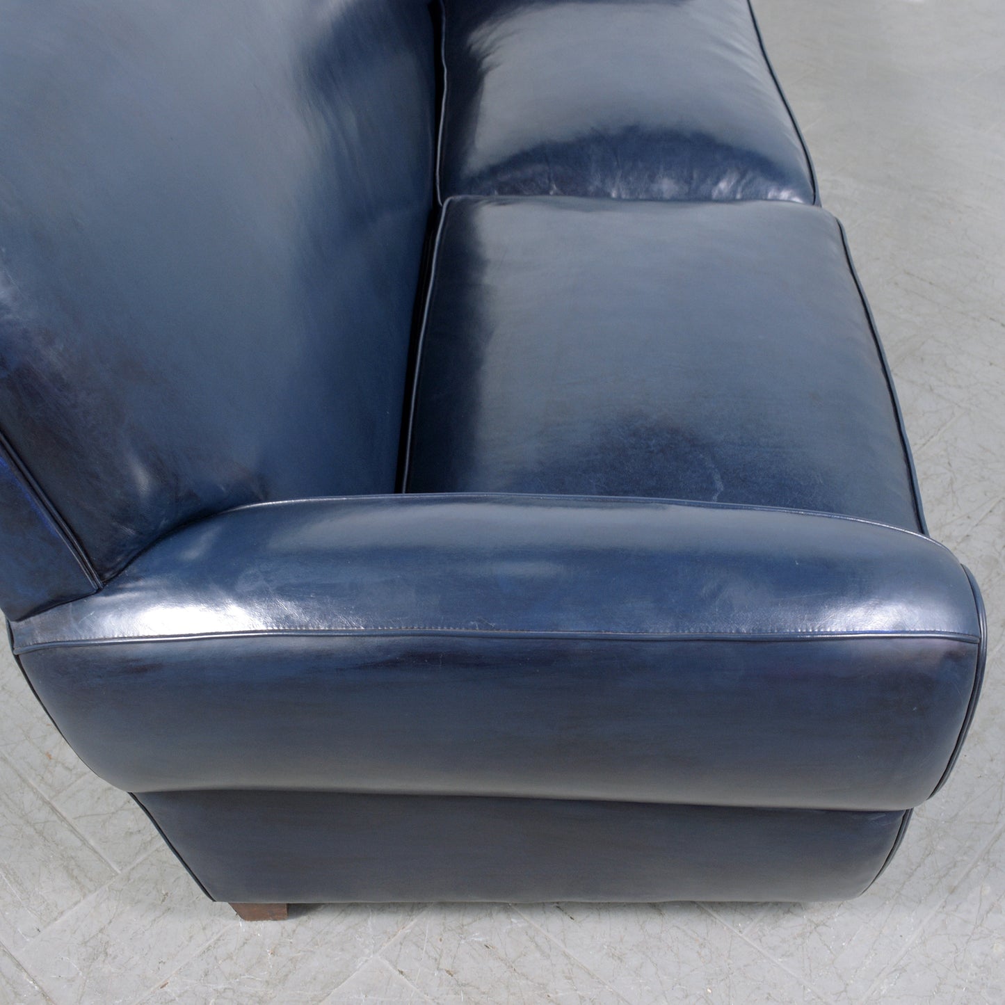 1970s Art Deco Sofa Restoration: Timeless Elegance in Navy Blue Leather