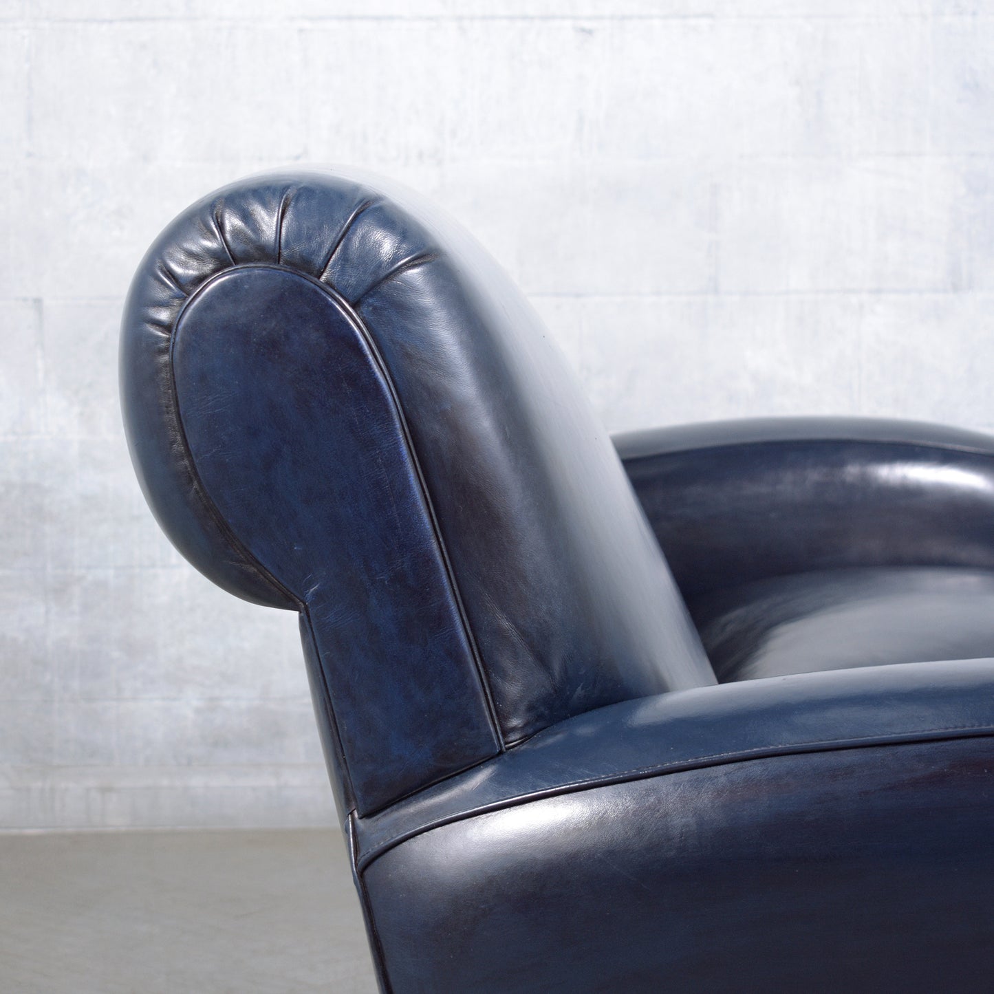 1970s Art Deco Sofa Restoration: Timeless Elegance in Navy Blue Leather