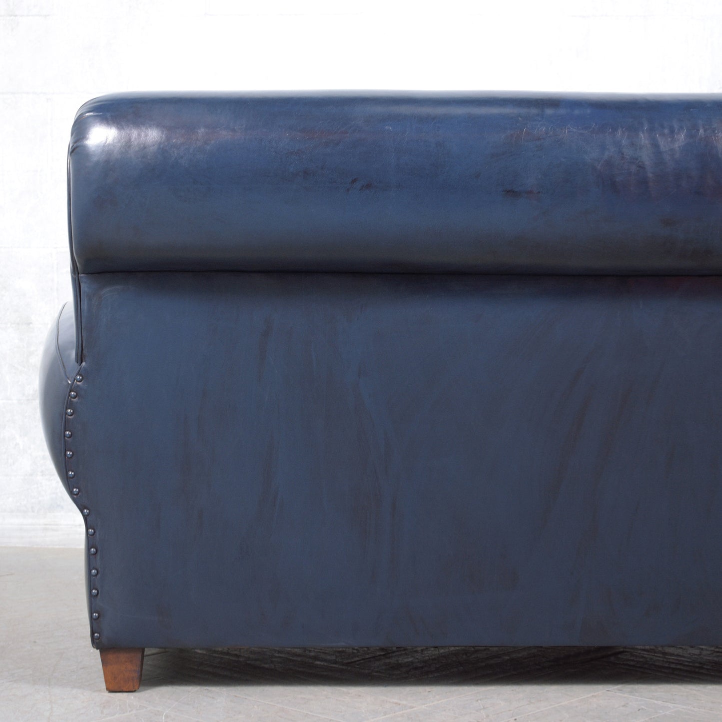 1970s Art Deco Sofa Restoration: Timeless Elegance in Navy Blue Leather