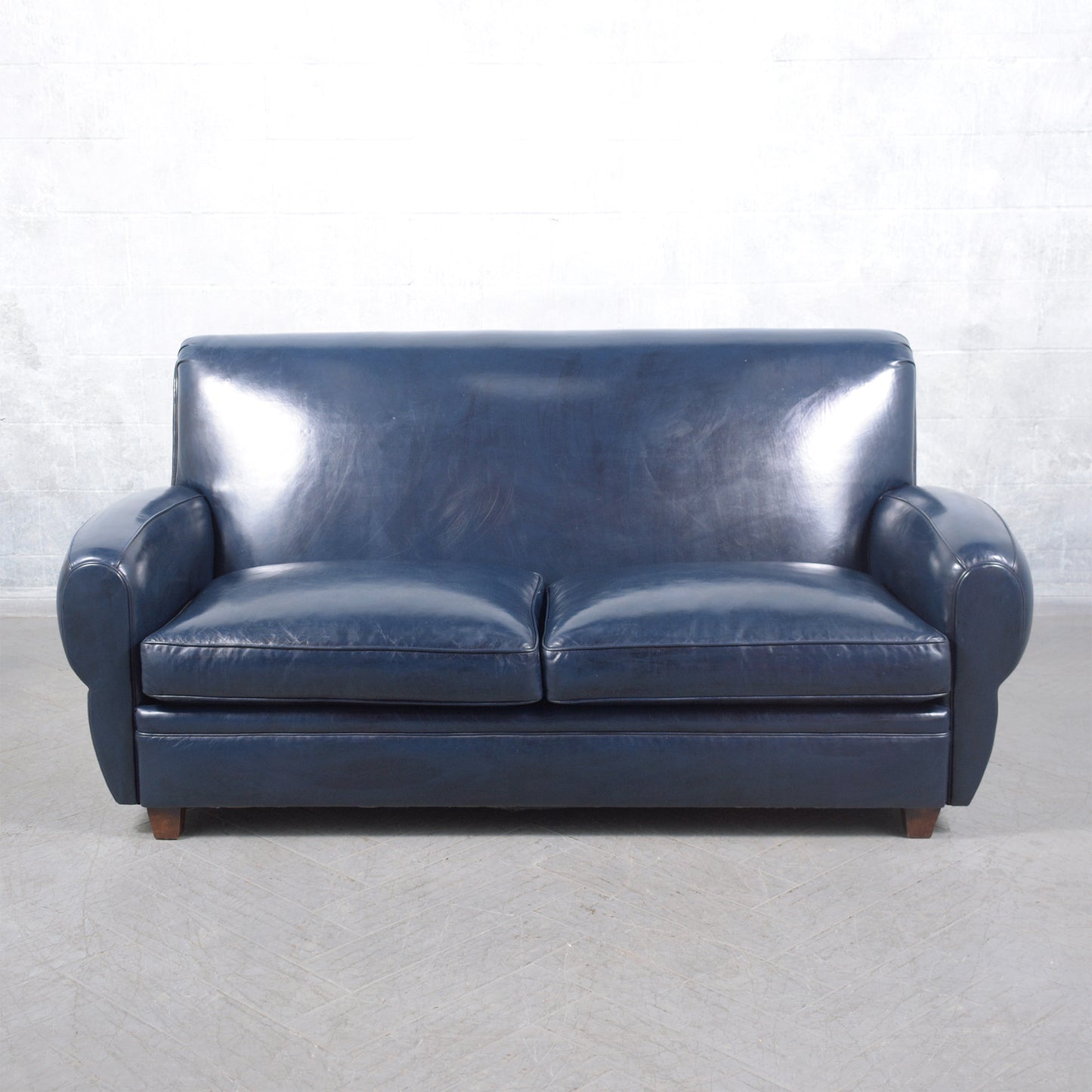 1970s Art Deco Sofa Restoration: Timeless Elegance in Navy Blue Leather