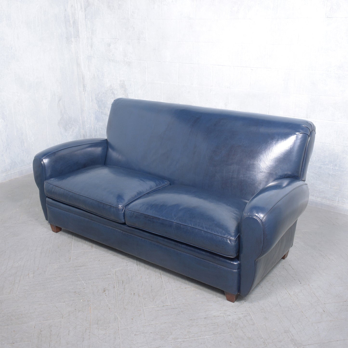 1970s Art Deco Sofa Restoration: Timeless Elegance in Navy Blue Leather