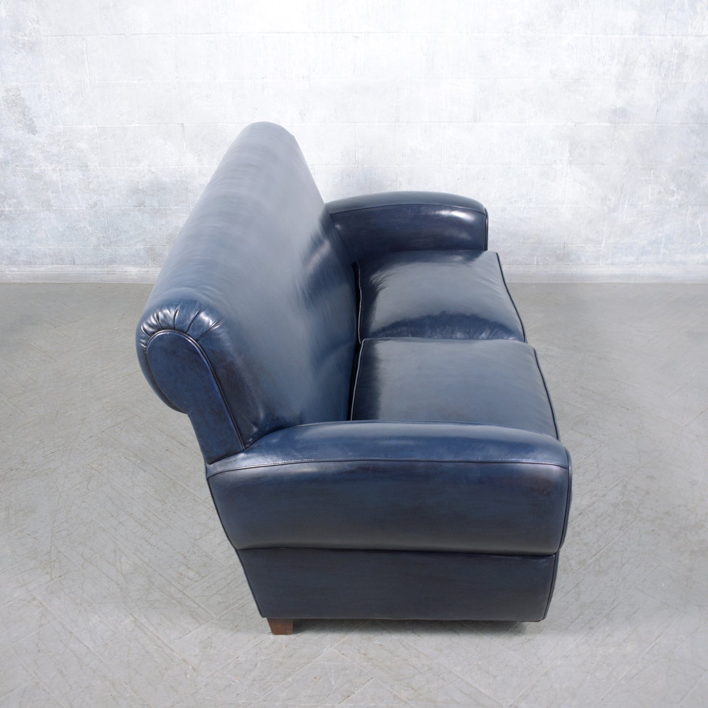 1970s Art Deco Sofa Restoration: Timeless Elegance in Navy Blue Leather