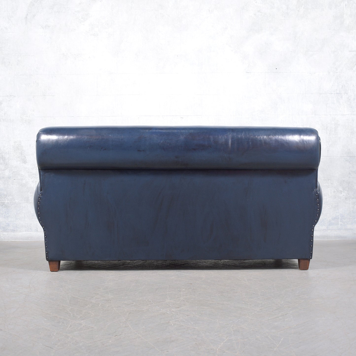 1970s Art Deco Sofa Restoration: Timeless Elegance in Navy Blue Leather