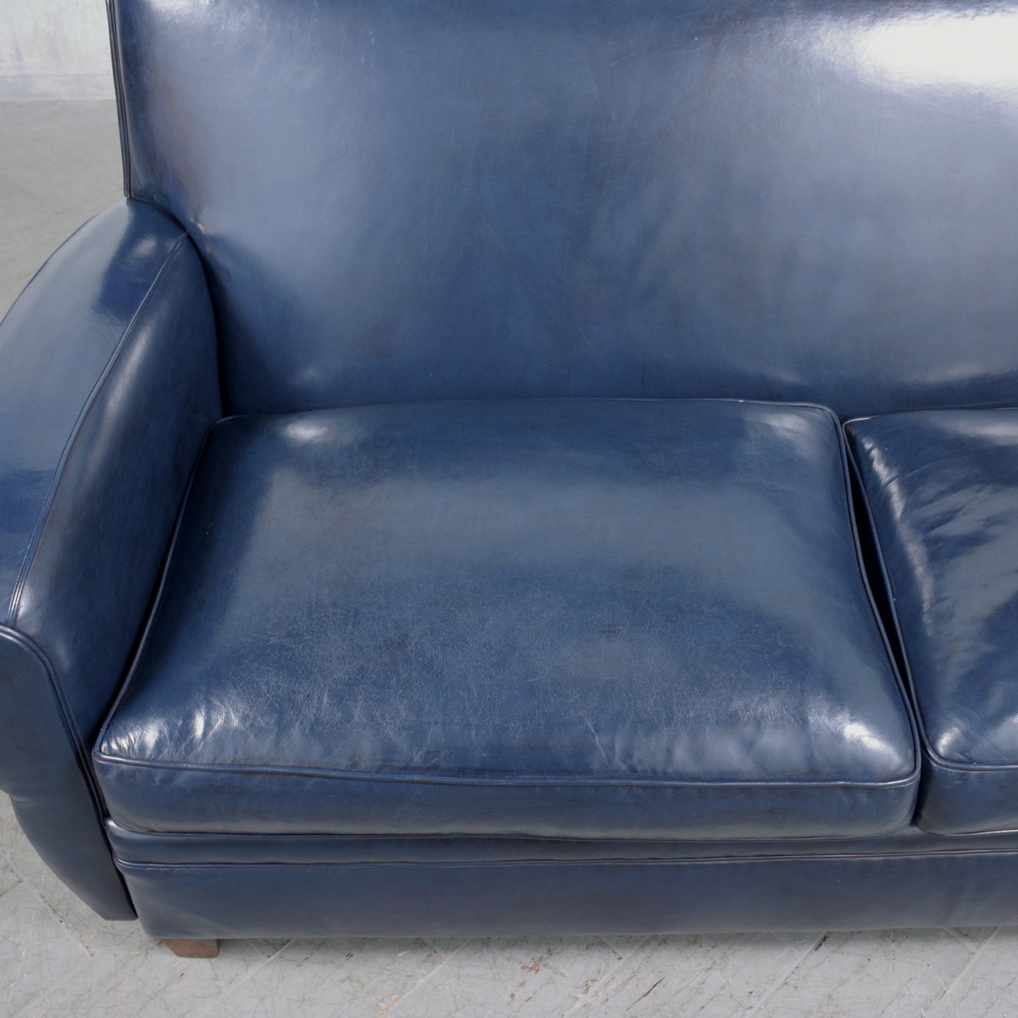 1970s Art Deco Sofa Restoration: Timeless Elegance in Navy Blue Leather